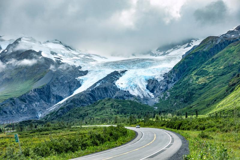wide shot of a mountain road in Alaska