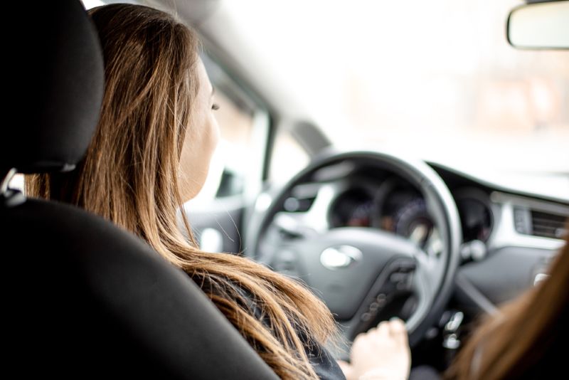 woman driving safely and responsibly